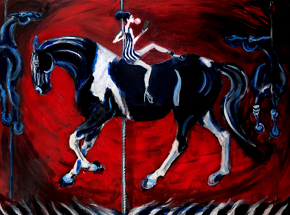 Child riding carousel horse